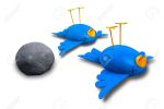 14232180-two-cartoon-style-blue-birds-with-orange-beaks-apparently-dead-and-belly-up-next-to-a-grey-stone