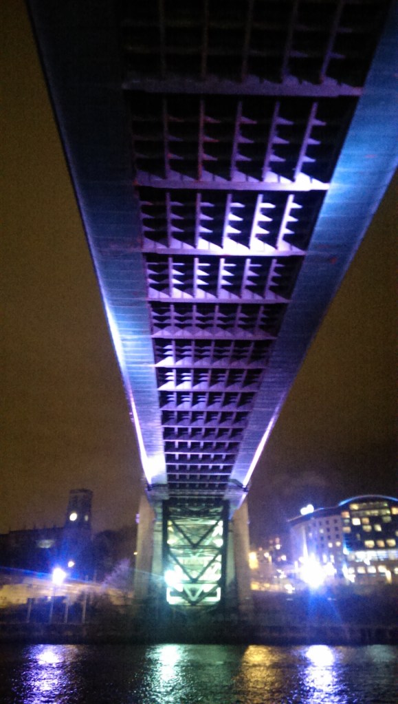 Underside of Tyne Bridge at night
