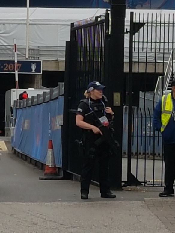 Police woman with gun